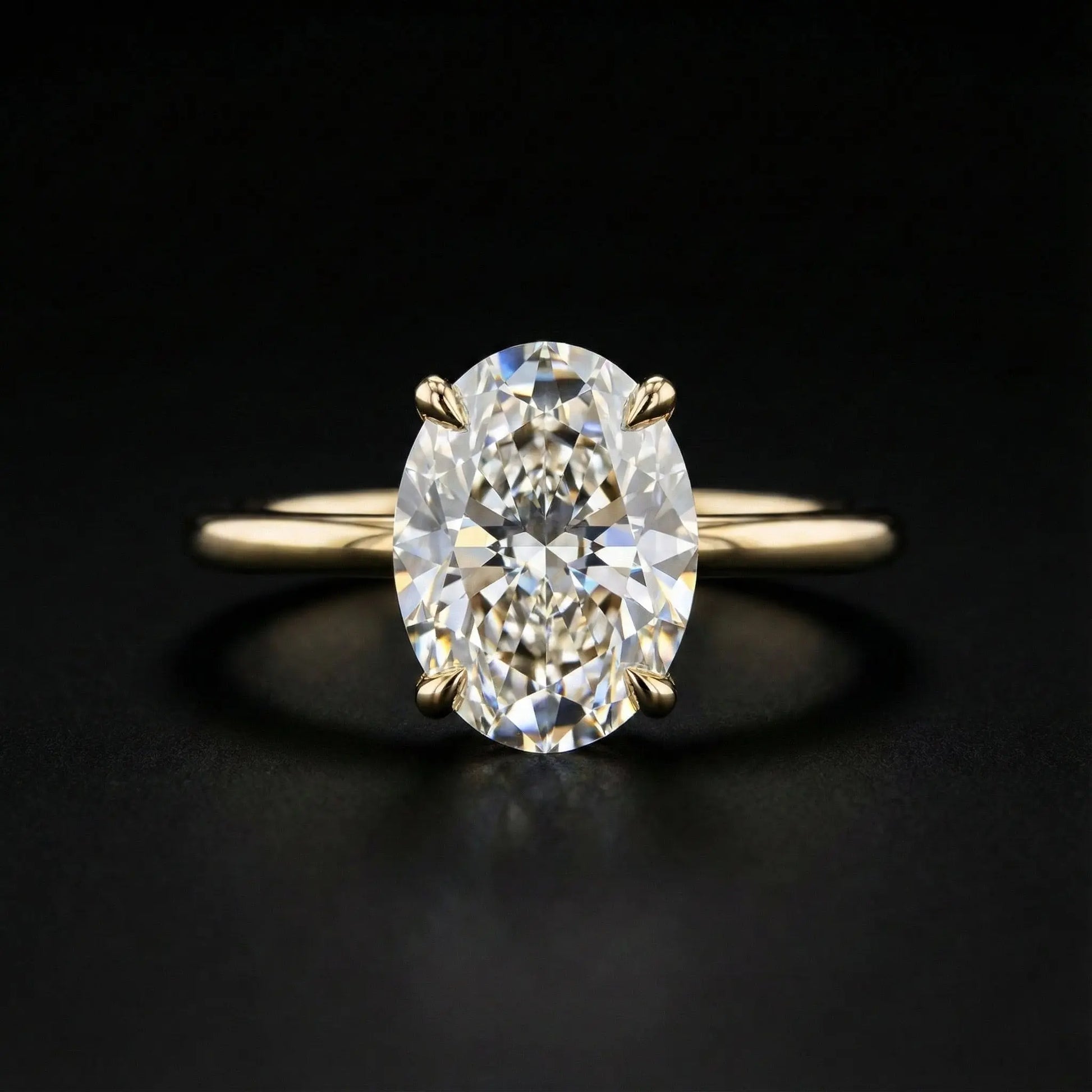 Gold ring with a large diamond on a black background