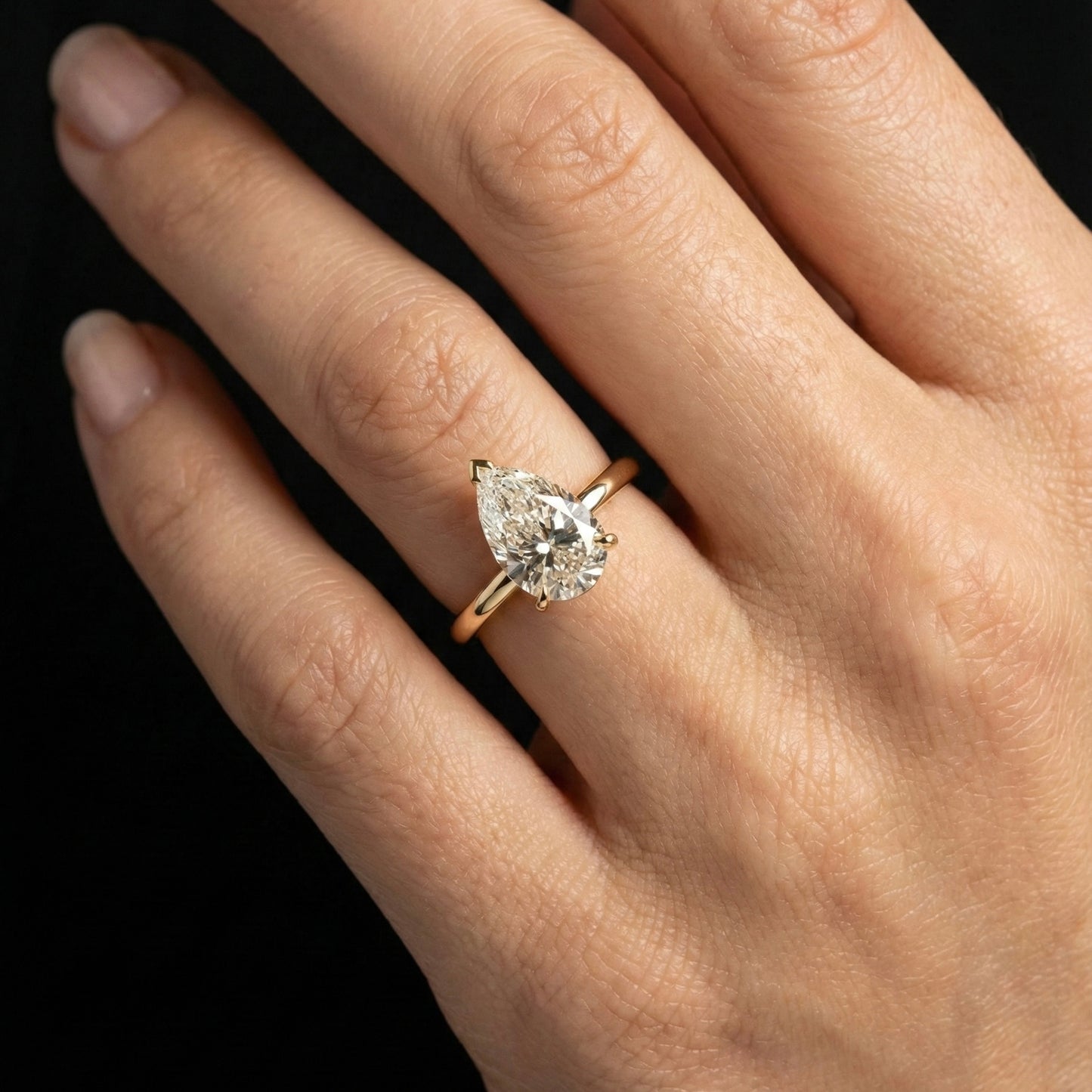 Elysia Pear Solitaire Ring - Auvra Diamonds