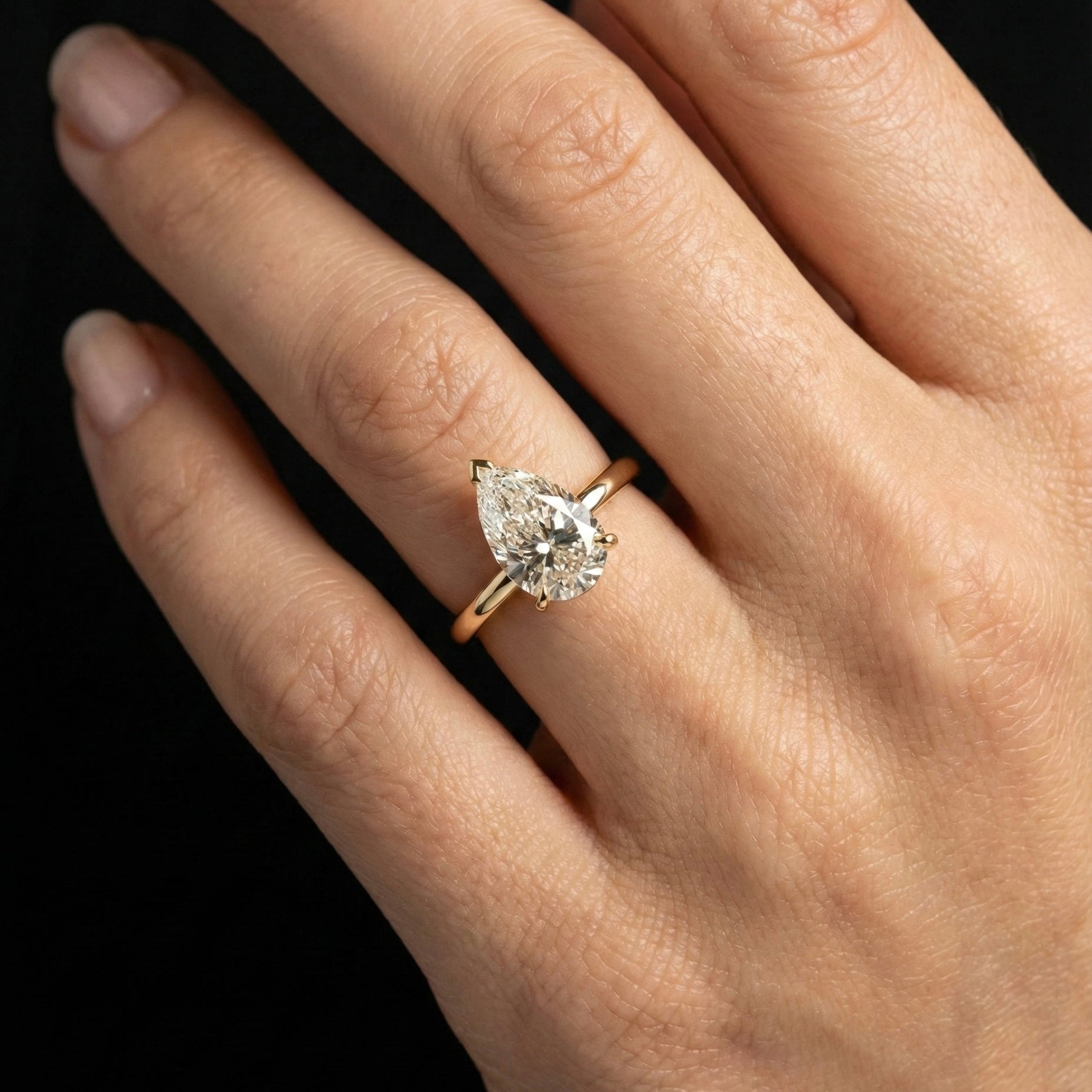 Elysia Pear Solitaire Ring - Auvra Diamonds