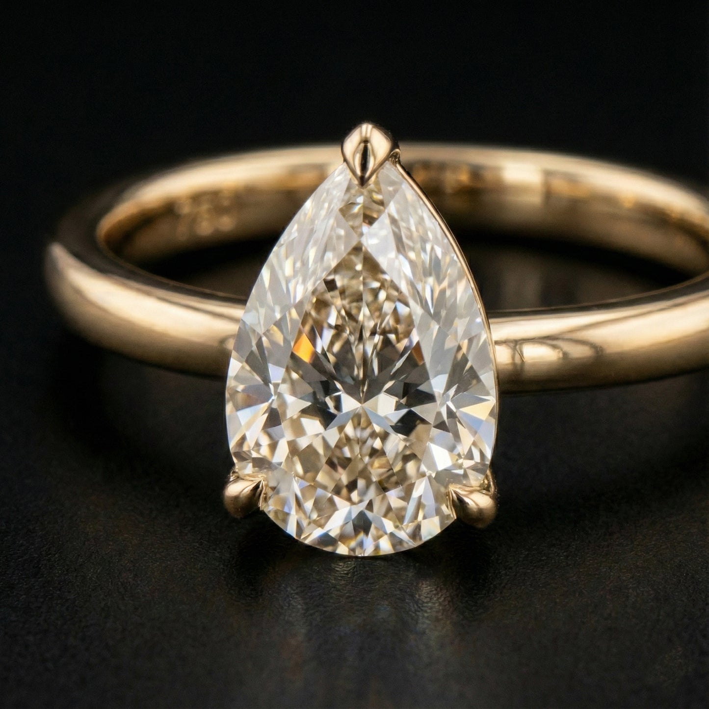 Elysia Pear Solitaire Ring - Auvra Diamonds