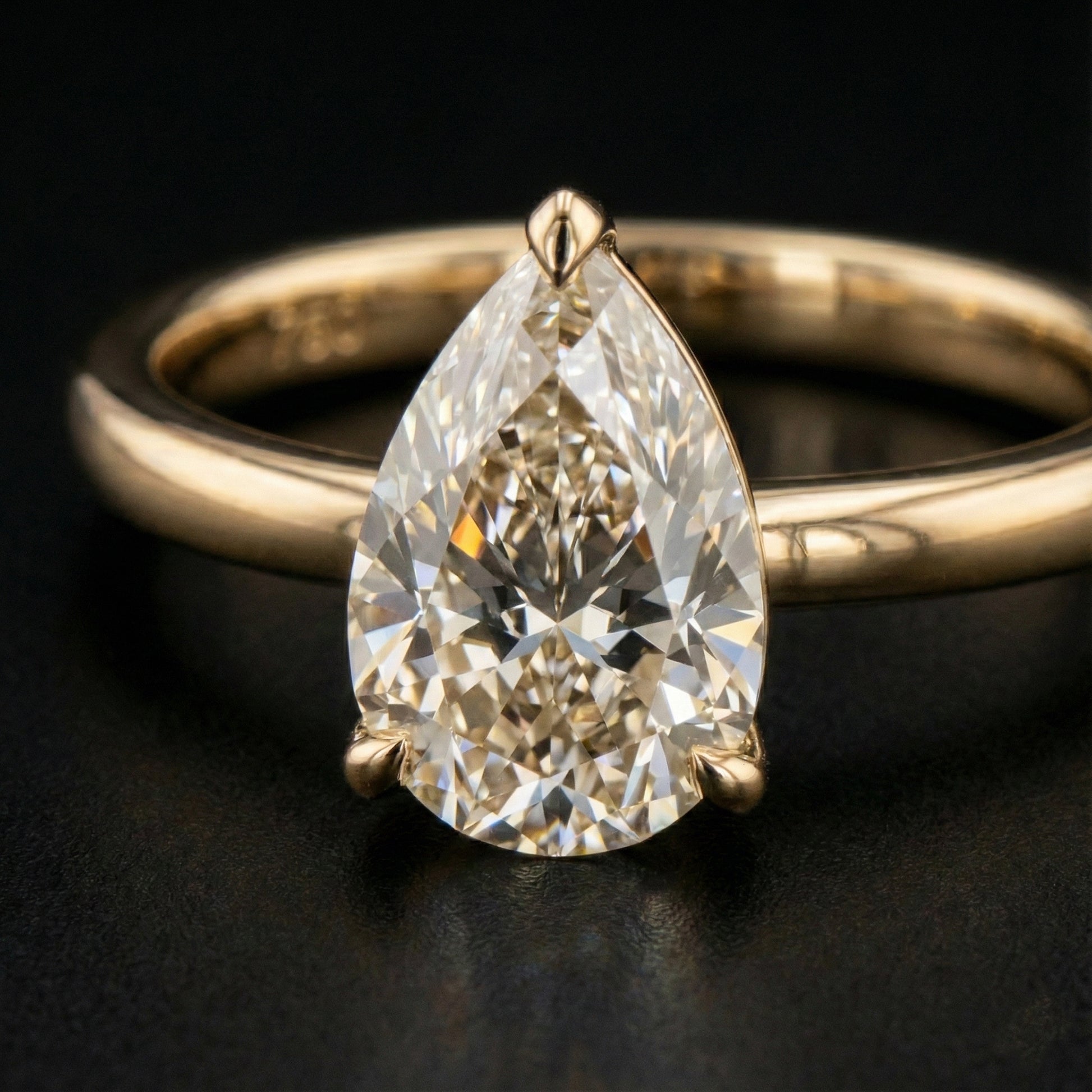 Elysia Pear Solitaire Ring - Auvra Diamonds