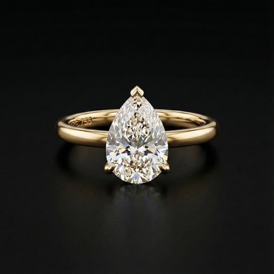 Elysia Pear Solitaire Ring - Auvra Diamonds