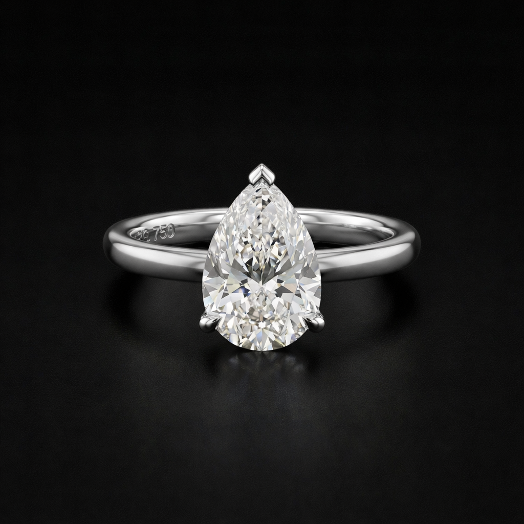 Elysia Pear Solitaire Ring - Auvra Diamonds